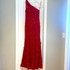 New, with tags on still, Berlinnova Red Sparkling dress. Size 6.